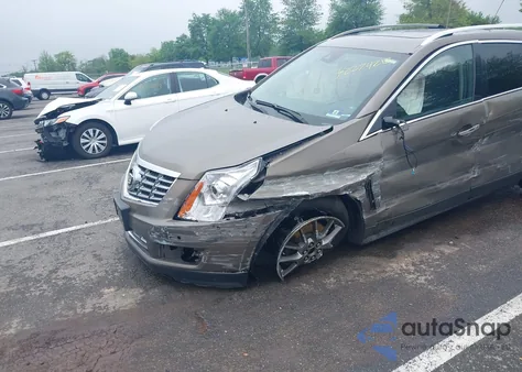 2015 Cadillac Srx Luxury Collection z USA, uszkodzony, nr VIN 3GYFNEE37FS519747